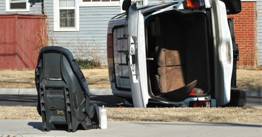 Car accident with toddler seat outside of the vehicle