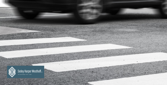 Car Driving Past Crosswalk